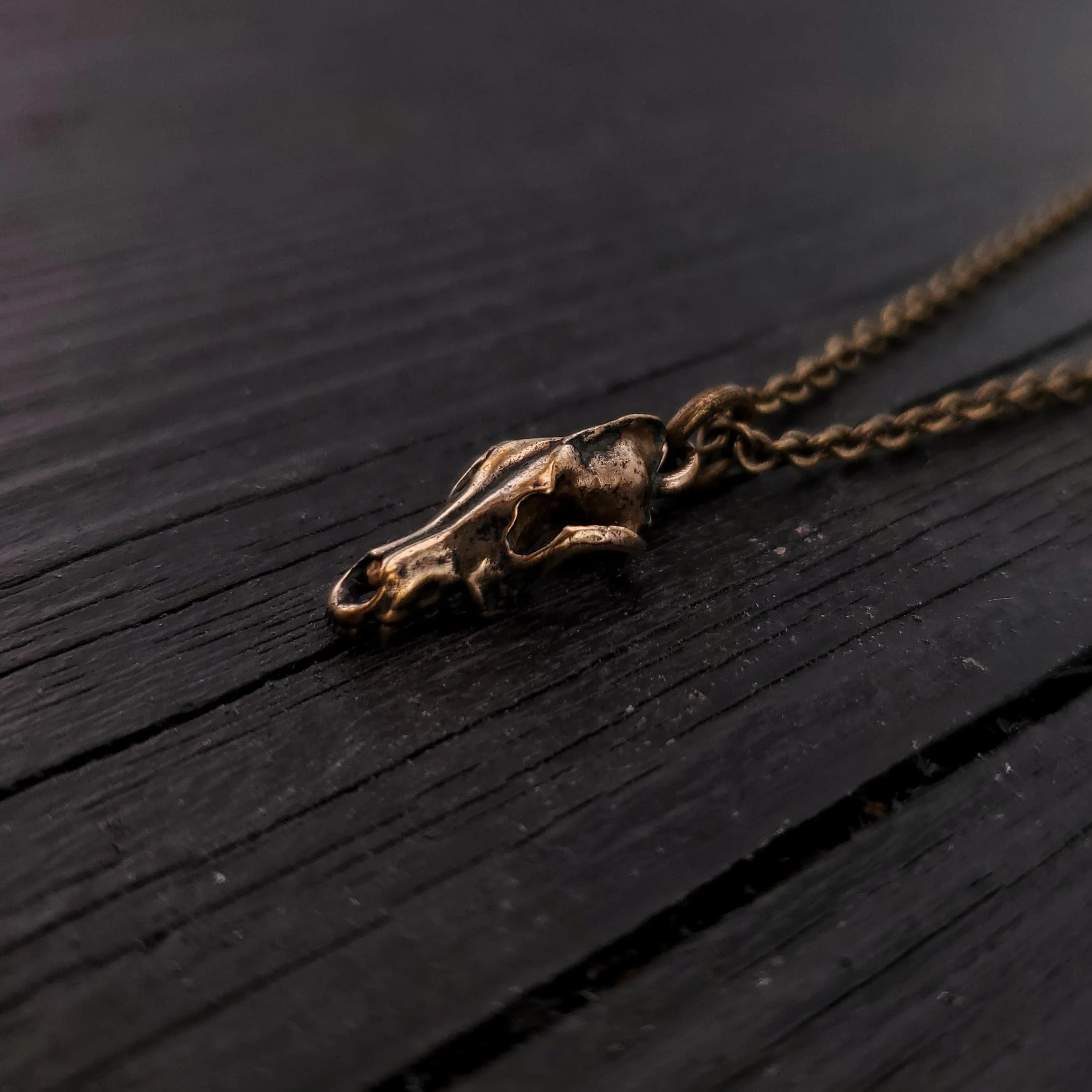 Tiny Grey Wolf Skull Charm Necklace