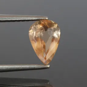 Topaz imperial | natural, peach color, pear cut 7x5 mm, VS, 0.9ct